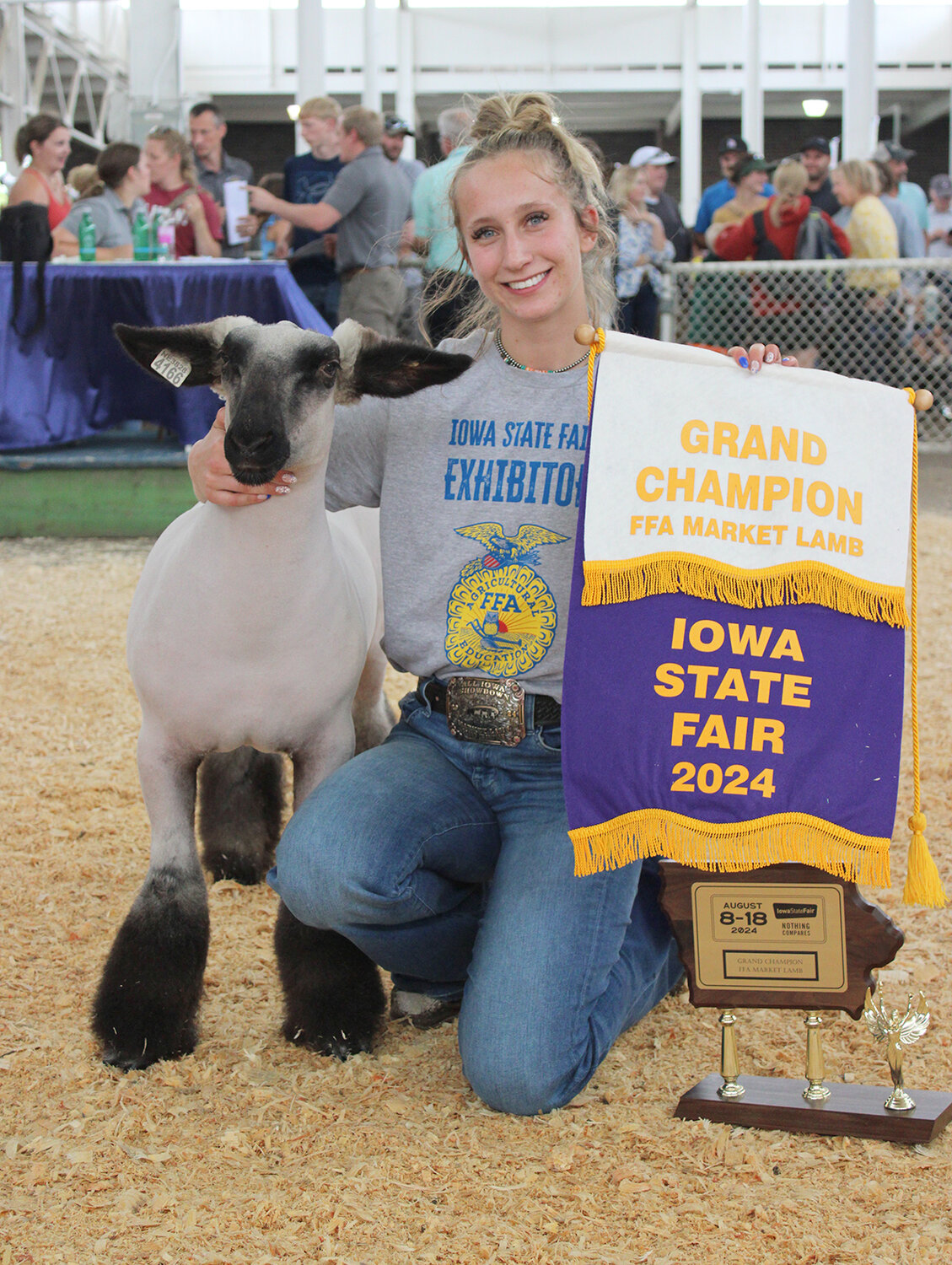 Wilton's Kiley Langley shows State Fair grand champion lamb Wilton